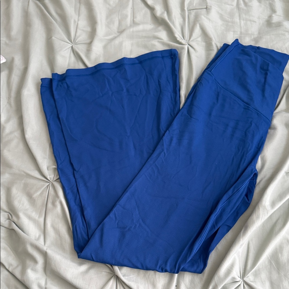 aerie real for me, flare, high-rise, crossover in seam in  blue.